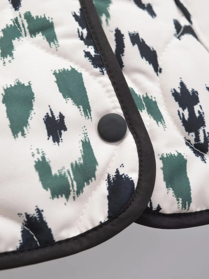 veste tendance matelassée en tissu blanc