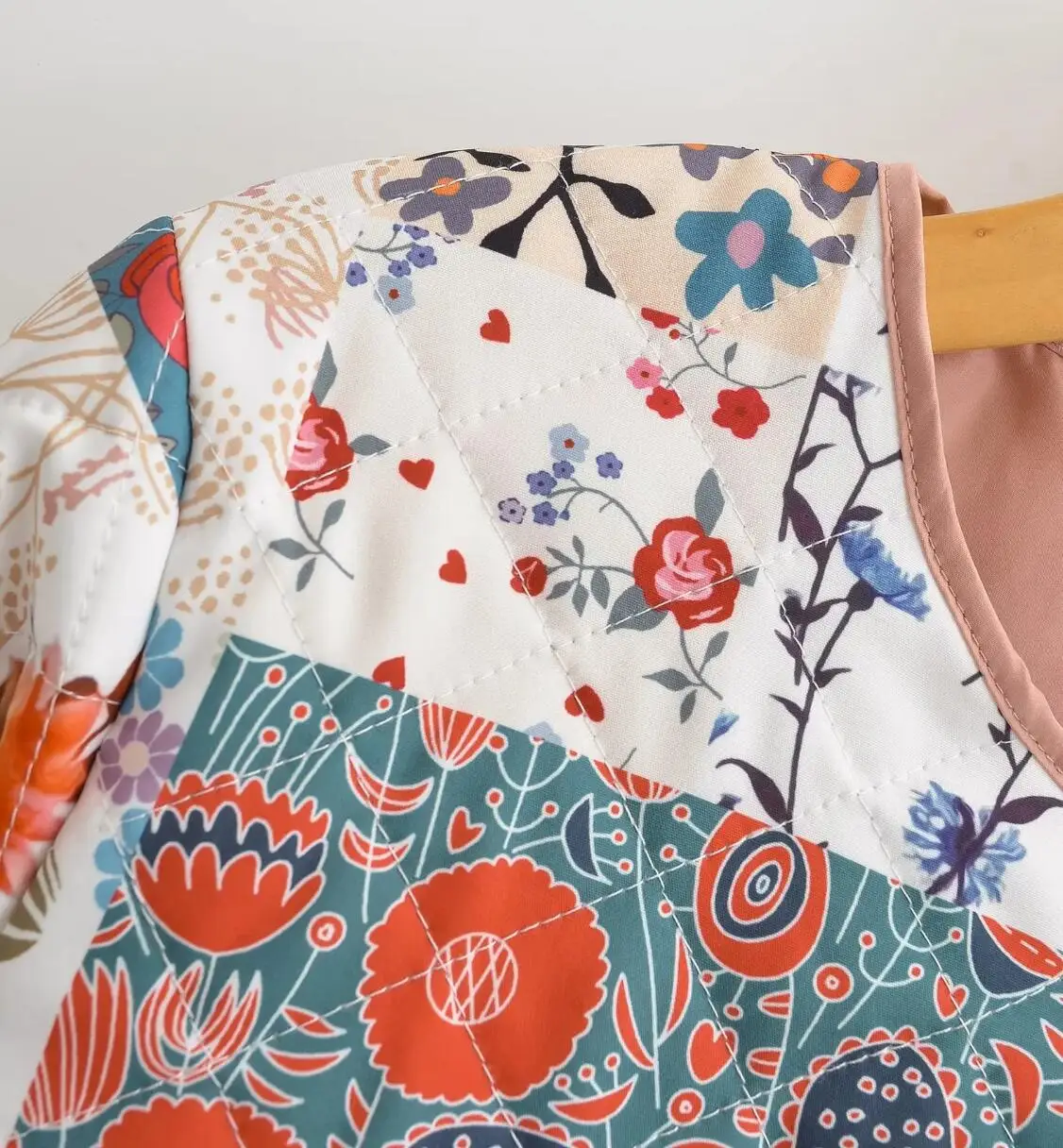 veste en maille rose pour femme